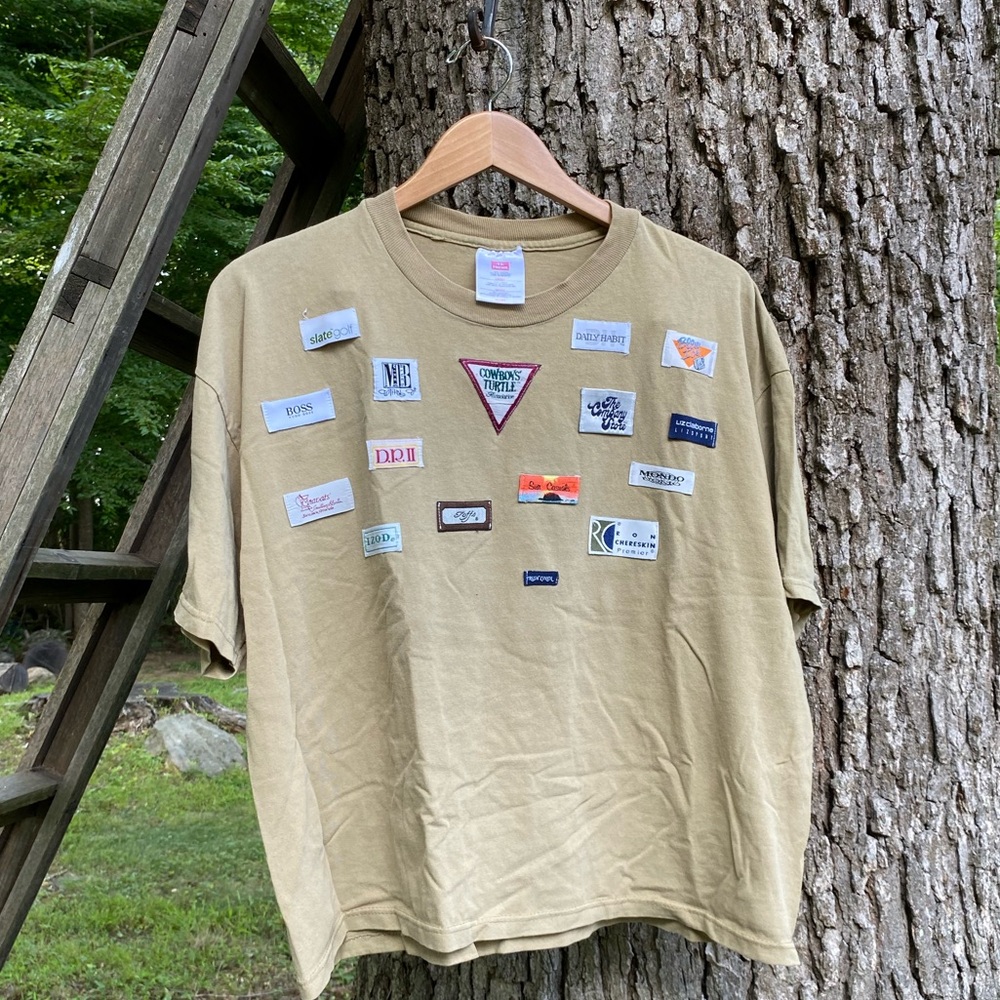 Tan hand made vintage tee with tag patches